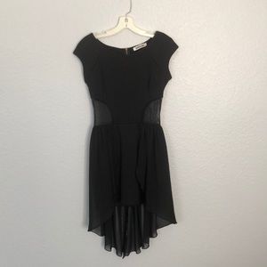Black high-low mini-dress.